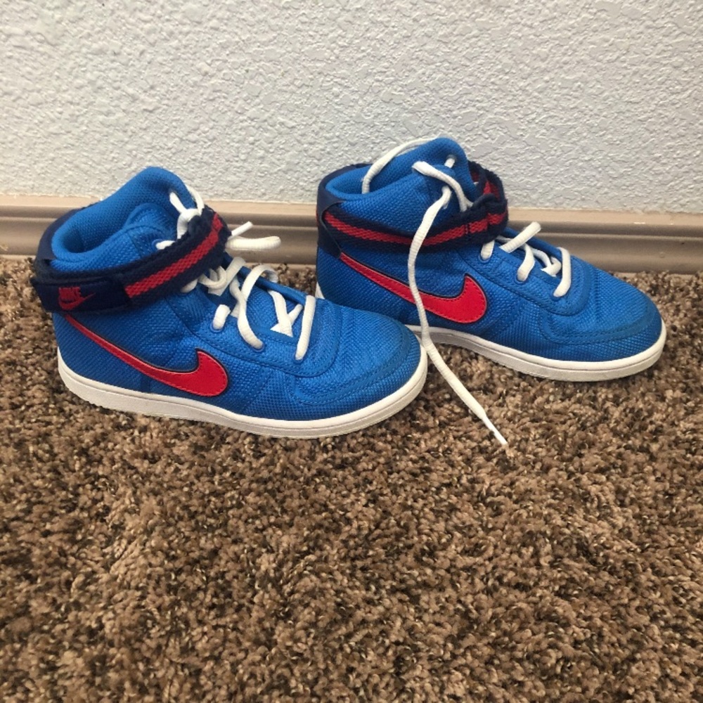 Red white and blue nike basketball shoes